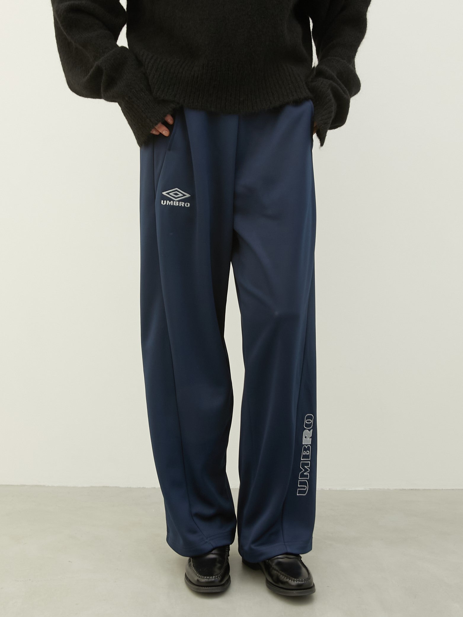 UMBRO×LA PEAU DE GEM The Urban Nomad track Pants