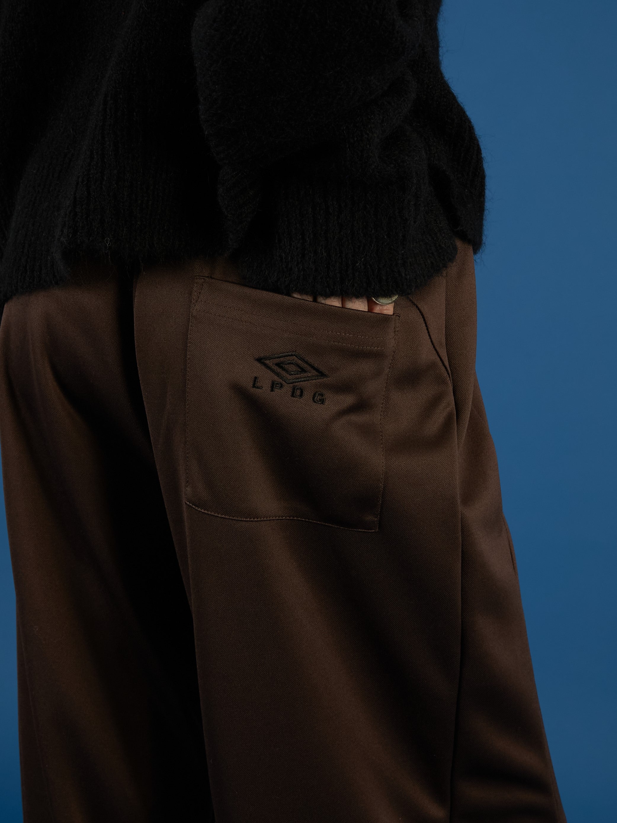 UMBRO×LA PEAU DE GEM The Urban Nomad track Pants
